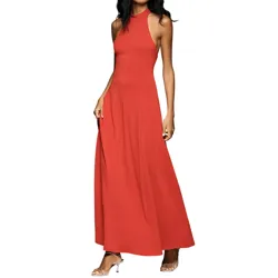 A woman wears a sleeveless, floor-length reddish-orange gown with a high neckline, paired with silver strappy heels.