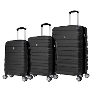 Three black hardshell suitcases of varying sizes with four wheels and telescopic handles.