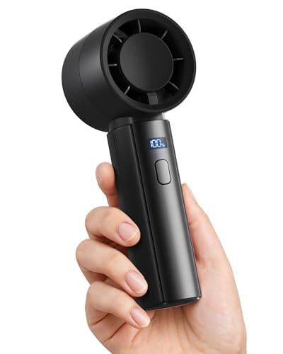 A handheld, bladeless portable fan with a digital battery display, held in a person's hand.