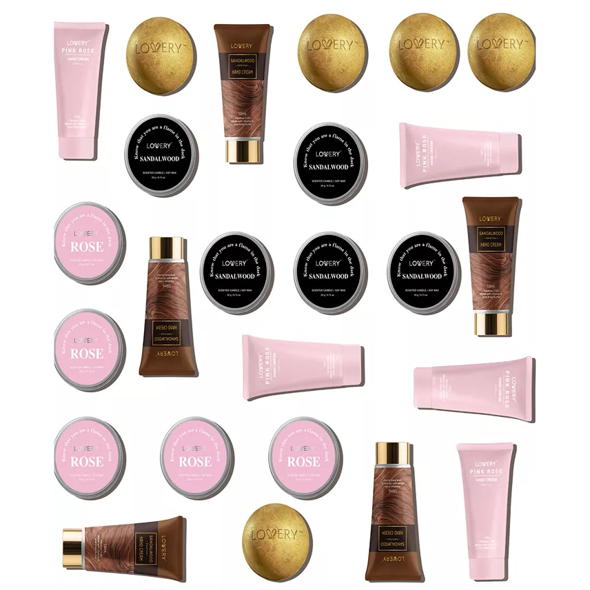 The Lovery 25-piece Assorted Body Care Set includes pink rose and sandalwood scented items: hand creams, bar soaps, bath bombs, body scrubs, and lotions, designed for skincare and aromatherapy.