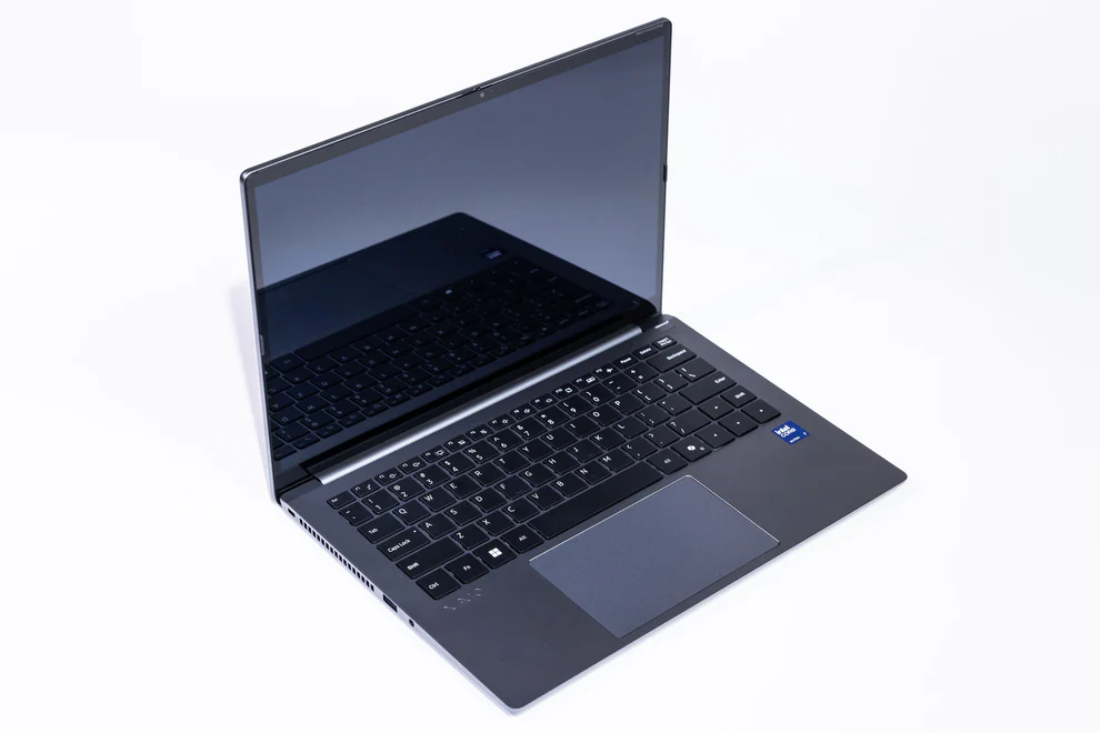 A sleek, open laptop with a modern design, featuring a visible Intel Inside sticker near the touchpad and a reflective screen.