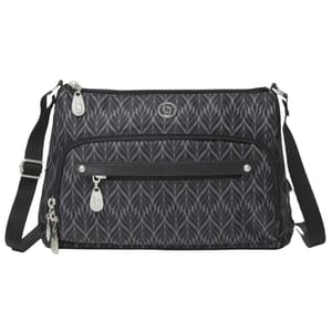 A black and gray Baggallini crossbody bag features a leaf pattern, a zippered front pocket, adjustable strap, and silver-tone hardware with their logo.