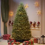 Christmas tree with lights, surrounded by wrapped presents, stockings hung on the wall, and decorative star lights.