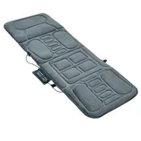 Massage mat with various padded sections and a connected remote control for customizable settings.