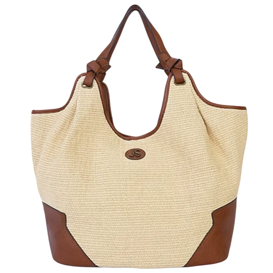A beige woven tote bag with brown leather trim and straps, featuring a decorative emblem on the front.