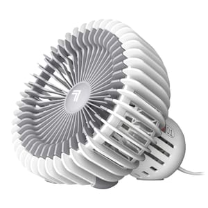 A compact Vornado desktop fan featuring a unique spiral grill design, gray and white color scheme, adjustable settings, and a cord for power connection.