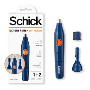 The Schick Expert Finish 3 in 1 Trimmer is designed to trim nose and ear hair and shape eyebrows. It includes a blue trimmer with an orange power button, eyebrow attachments, and indicates painless hair removal. Battery included.