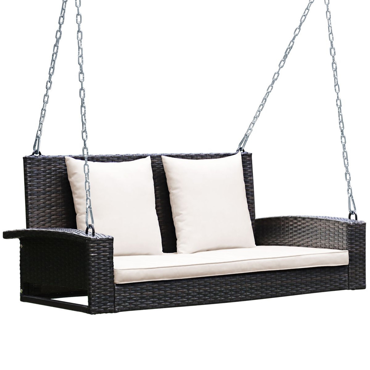 Outdoor rattan swing chair with cream cushions, supported by metal chains.