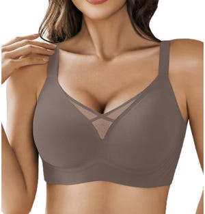 A wireless bra with a V-neck design and broad straps, featuring a mesh panel at the center for added style. The bra is seamless and designed for comfort, offering a smooth fit.