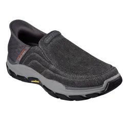 Slip-on shoe with a dark gray, textured fabric upper, cushioned sole, and contrasting black and gray outsole. Features \“Slip-Ins\“ branding on the side and \“Goodyear\“ on the sole.