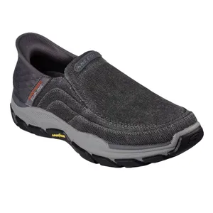 Slip-on shoe with a dark gray, textured fabric upper, cushioned sole, and contrasting black and gray outsole. Features \“Slip-Ins\“ branding on the side and \“Goodyear\“ on the sole.