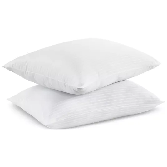 Two white pillows with a subtle striped pattern, stacked on top of each other.