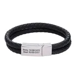 A black double-strand braided leather bracelet features a silver clasp engraved with \“Emma 13/08/2014\“ and \“David 16/05/2017.\“
