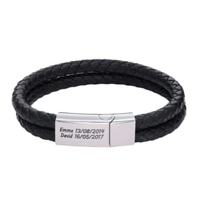 A black double-strand braided leather bracelet features a silver clasp engraved with \“Emma 13/08/2014\“ and \“David 16/05/2017.\“