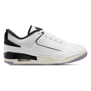 White and black low-top sneaker with air cushioning visible in the heel.