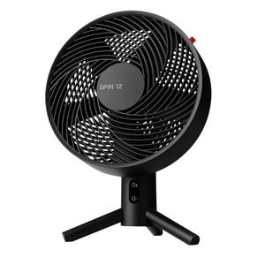 A black Vornado Spin 12 Oscillating Desk Fan with a spiral grille design. It features a compact three-leg stand and a central control button, suitable for efficient airflow and modern decor.