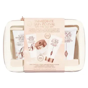 Immediate Skin Revival On The Go Set includes Charlotte's Magic Hydration Revival Cleanser (30 ml), Charlotte's Magic Cream (30 ml), and Charlotte's Magic Body Cream (50 ml) in a zippered case.