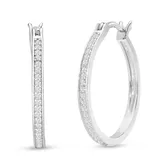 A pair of thin, silver hoop earrings encrusted with small diamonds, featuring a sleek and elegant design.