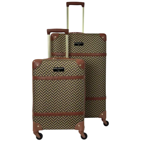 Two pieces of patterned luggage featuring brown trim, gold handles, and four wheels each for easy maneuvering.