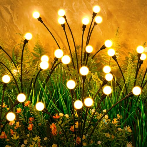 A cluster of solar-powered lights designed to resemble fireflies, with glowing orbs on thin, flexible stakes meant to be placed among garden plants.