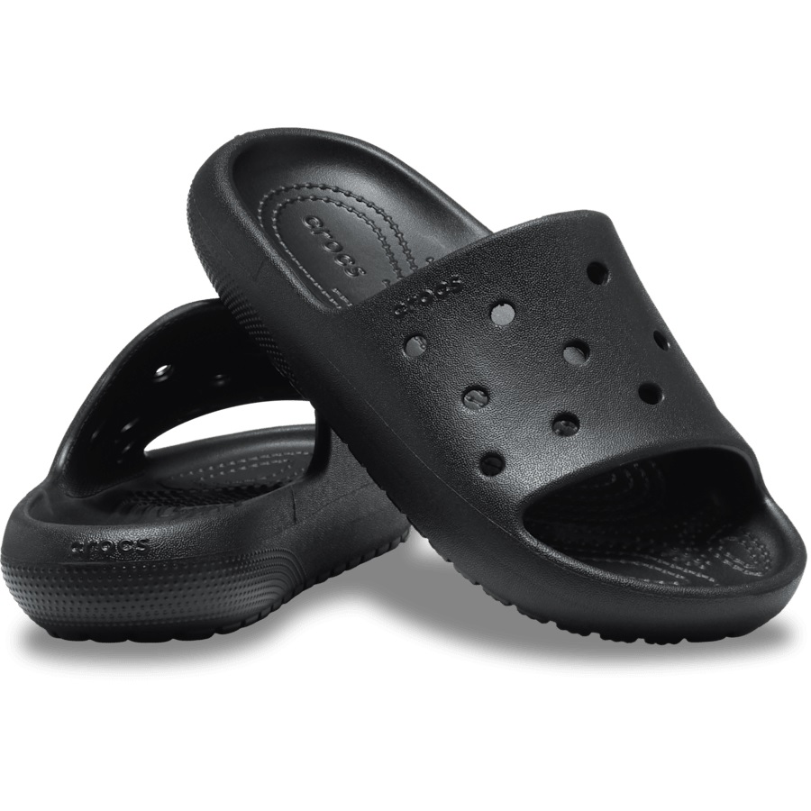 Black Crocs Kids' Slides with perforated upper for breathability and textured footbed for comfort. Features include open toe design and small circular ventilation holes.