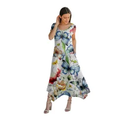 A woman is wearing a long dress with a colorful butterfly and floral pattern. She pairs it with beige high-heeled sandals.