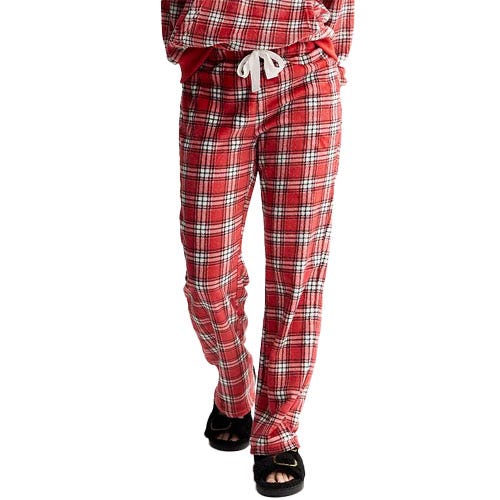 Red plaid pajama pants with a white drawstring and a matching plaid top, paired with black slides.