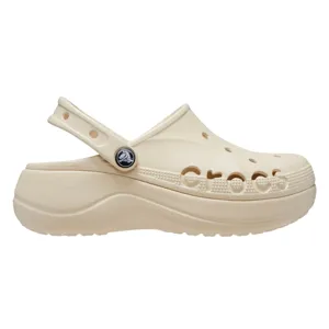 Beige platform Crocs clog with holes on the top and a pivoting heel strap. The branding \“Crocs\“ is embossed on the side, featuring a circular logo button near the strap.