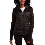 A woman is wearing a black zip-up jacket with a padded front and knitted sleeves. The jacket features a hood, zippered pockets, and a small logo patch on the sleeve.