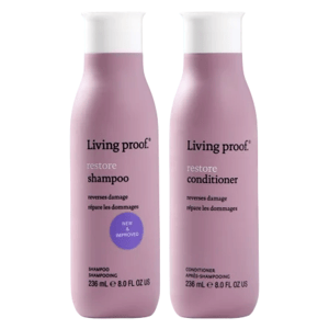 Living Proof Restore Shampoo and Conditioner bottles, each 236 mL (8.0 fl oz US), designed to reverse damage and repair hair.
