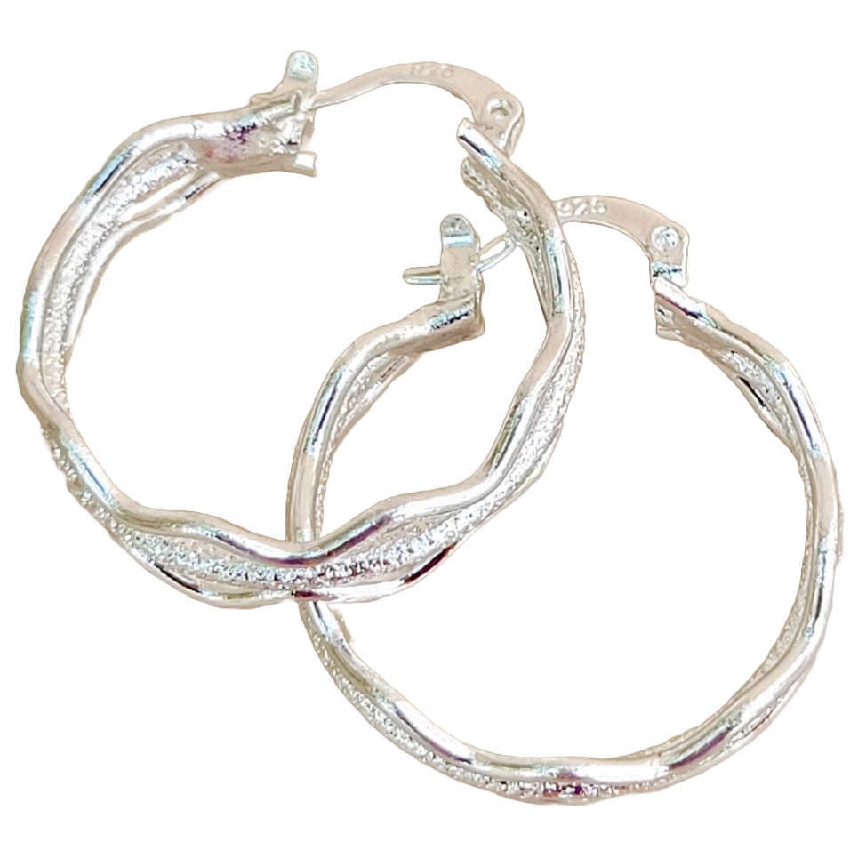 Silver-tone twisted hoop earrings with a shiny finish.