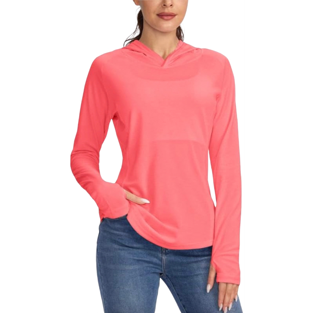 Bright coral pink long-sleeve sun-protection hoodie with a relaxed fit, featuring a V-neck and thumb holes, paired with blue jeans.
