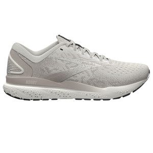 A light gray athletic shoe with a streamlined design, featuring the word \“Ghost\“ on the side and a speckled sole for traction.