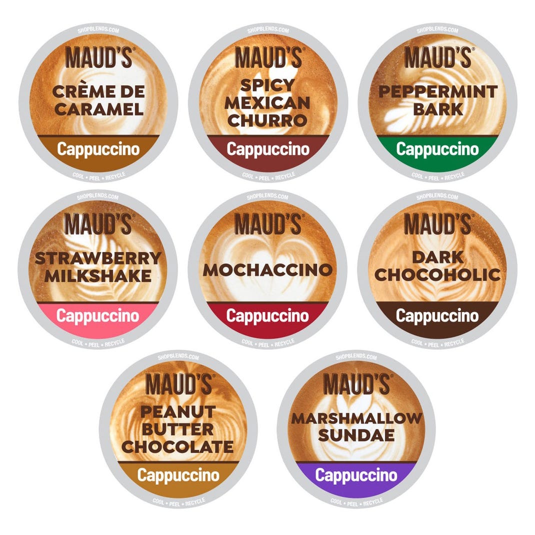 Nine different flavored cappuccino pods, including Creme de Caramel, Spicy Mexican Churro, Peppermint Bark, Strawberry Milkshake, Mochaccino, Dark Chocoholic, Peanut Butter Chocolate, and Marshmallow Sundae.
