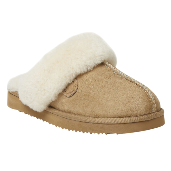 Shearling-lined women's slipper with a suede exterior and plush, fluffy collar, featuring a flat rubber sole.