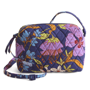 A quilted crossbody bag with a vibrant floral pattern, featuring purple, blue, and orange flowers, and a matching adjustable strap.
