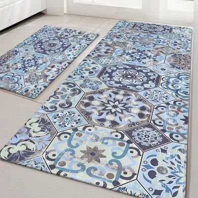 Two decorative floor mats with intricate blue and brown tile patterns featuring floral and geometric designs.
