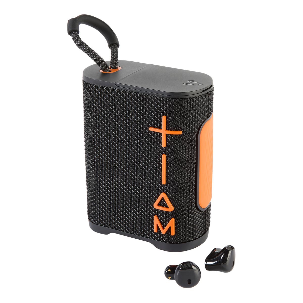 A portable black and orange Bluetooth speaker with large plus and minus volume buttons, featuring an attached carrying handle, accompanied by a pair of black wireless earbuds.