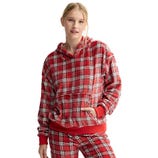 A person is wearing a red and white plaid hoodie with matching pants.