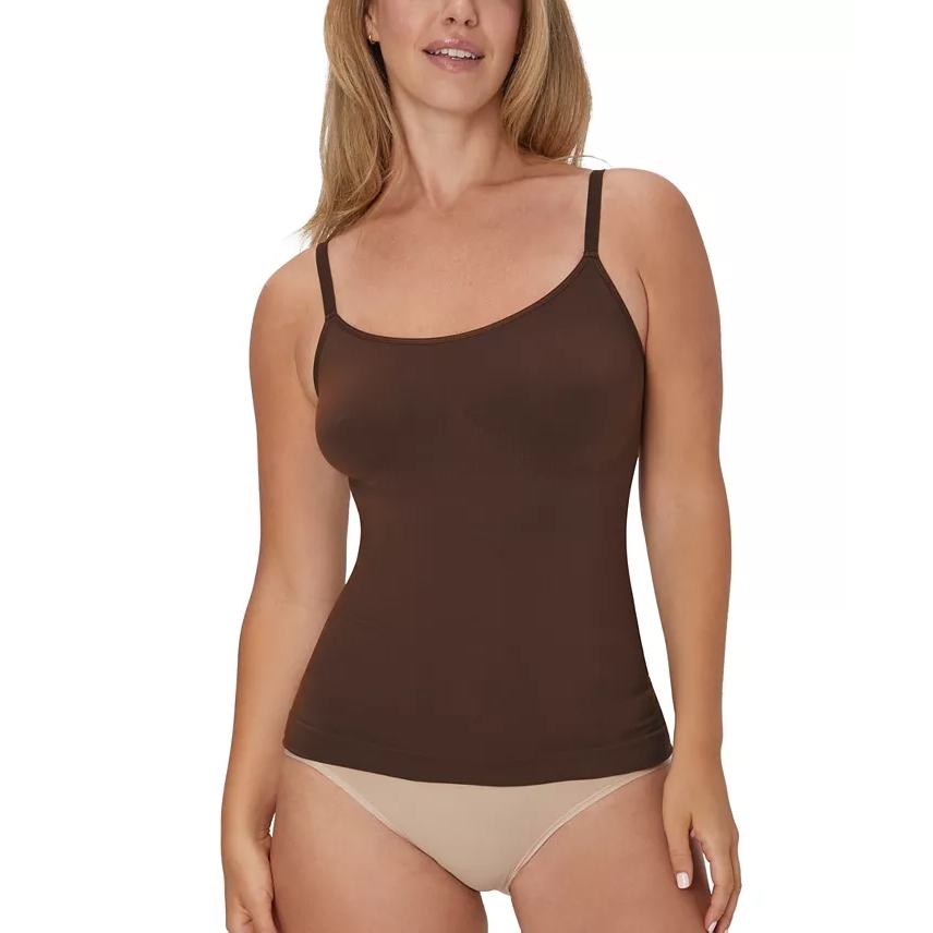 A woman is wearing a brown camisole with adjustable straps and beige underwear.