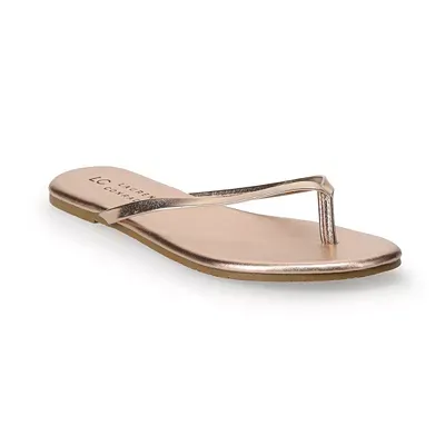 A pair of LC Lauren Conrad Honey 2 sandals in a metallic hue with a thong strap design and flat sole.