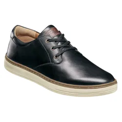 Black leather casual oxford-style shoe with a tan rubber sole and lace-up closure.