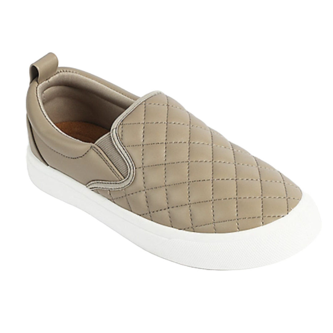 Kate Quilted Slip On Sneakers feature a beige quilted design with a white rubber sole, padded collar, and pull tab at the heel for easy wear.