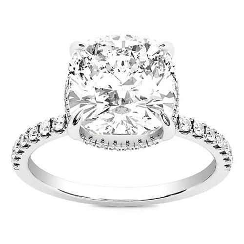 A white gold engagement ring featuring a large cushion-cut diamond in the center, with smaller diamonds encrusted along the band.