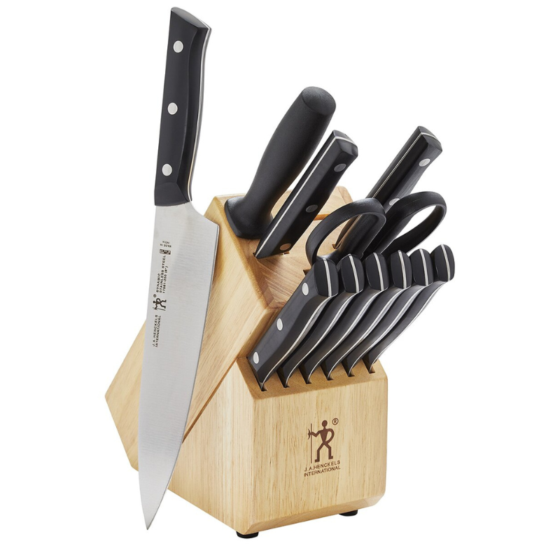 12-piece Zwilling Knife Block Set includes a wooden block with a chef's knife, bread knife, utility knife, paring knife, steak knives, kitchen shears, and a sharpening steel, all with black handles.