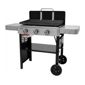 A 28-inch Weber Gas Griddle with a black body, stainless steel side shelves, three control knobs, and a hinged lid, mounted on a cart with wheels for mobility.