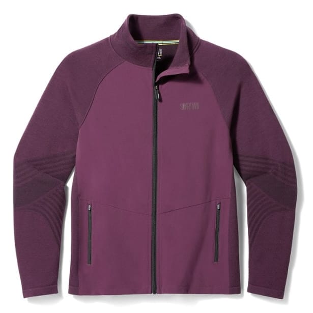 The Smartwool Intraknit Active Jacket is a maroon-colored, full-zip jacket featuring long sleeves and zippered side pockets, designed for active use with breathable fabric and articulated panels for enhanced mobility.