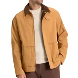 A tan jacket with a dark brown corduroy collar, silver snaps, and paired with a cream sweater and brown pants.