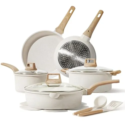 A set of white non-stick cookware with wooden handles, including two frying pans, three lidded pots, and a set of cooking utensils.