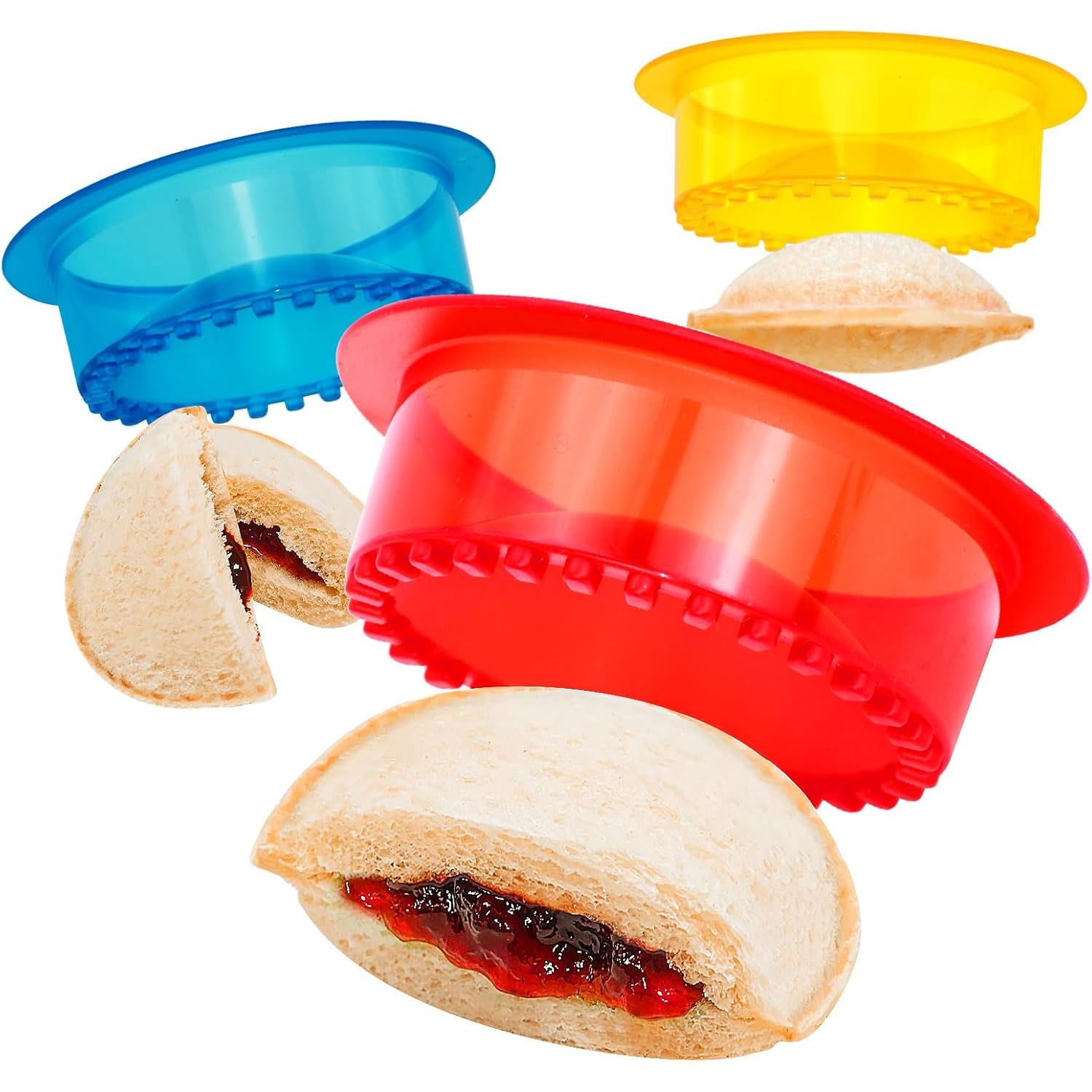 Set of colorful sandwich cutters designed to create sealed, crustless sandwiches. Includes red, blue, and yellow cutters.